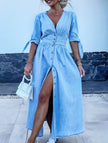 FJØRNA deep V-neck fitted white shirt dress displayed on a hanger, showcasing its sleek design and tailored fit.