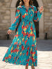 Blue printed tie-waist lantern sleeve dress by FJØRNA, featuring flowy fabric and elegant design.
