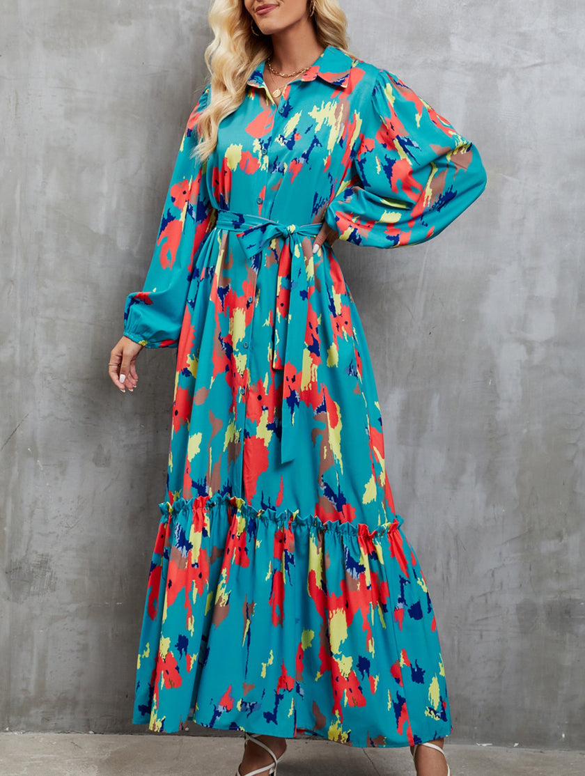 Blue printed tie-waist lantern sleeve dress by FJØRNA, featuring a stylish silhouette and elegant design.