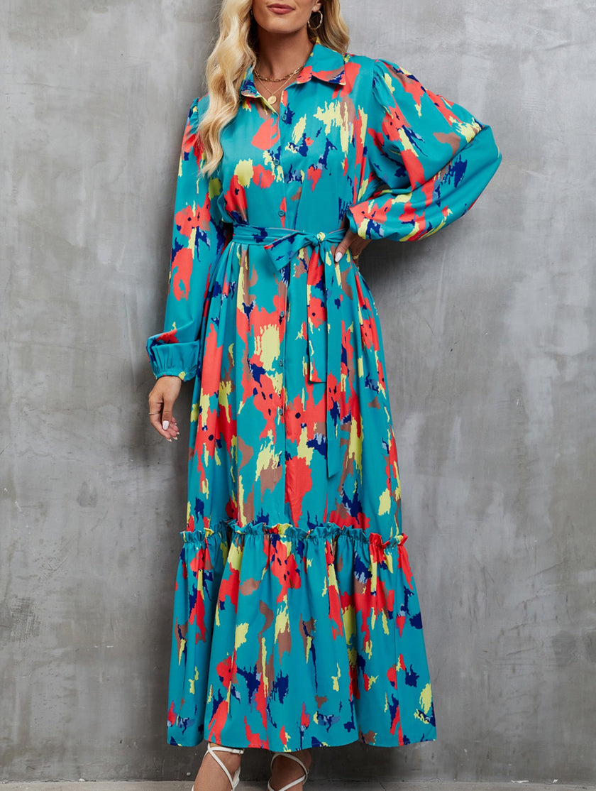 Blue printed tie-waist lantern sleeve dress by FJØRNA featuring a stylish silhouette and elegant design.