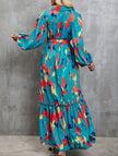 FJØRNA printed white tie-waist lantern sleeve dress with floral pattern and voluminous sleeves, perfect for casual or semi-formal wear.
