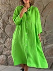 White cotton linen maxi dress by FJØRNA featuring solid color, button details, and a flowing, elegant silhouette.