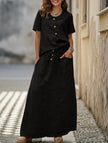 Black casual loose dress for women by FJØRNA, perfect for weddings or everyday wear, with a relaxed, comfortable fit.