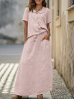 Pink FJØRNA casual loose dress for women, suitable for weddings, featuring a solid color and relaxed fit.