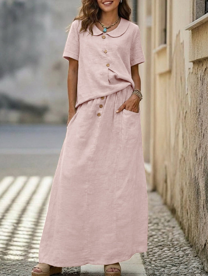 Pink FJØRNA casual loose dress for women, suitable for weddings, featuring a solid color and relaxed fit.