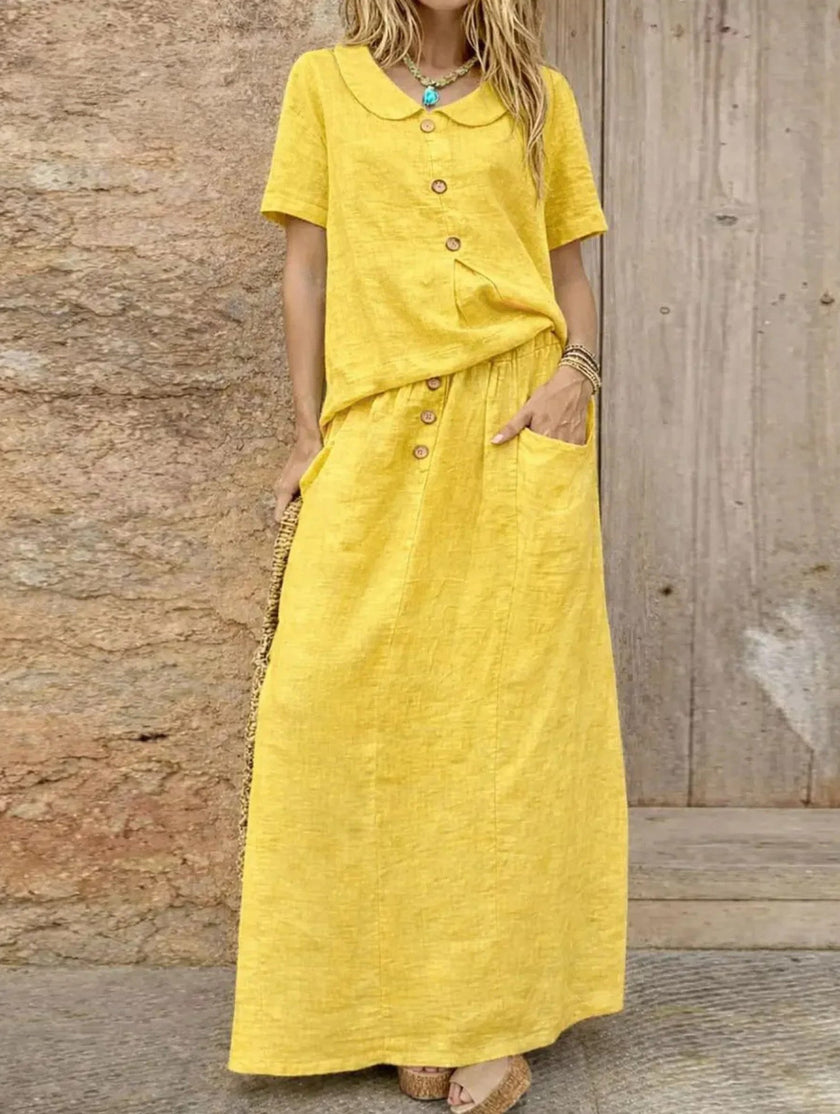 Yellow casual loose dress for women by FJØRNA, ideal for weddings or everyday wear, featuring a comfortable, relaxed fit.