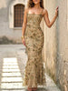 White backless maxi dress with a low neckline and tie details from FJØRNA, perfect for elegant occasions.
