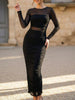 Black mesh patchwork ruched bodycon maxi dress by FJØRNA, featuring fitted design and elegant ruching details.