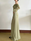 Elegant white French-style slim-fit dress by FJØRNA, showcasing a fitted bodice and graceful design on a model.