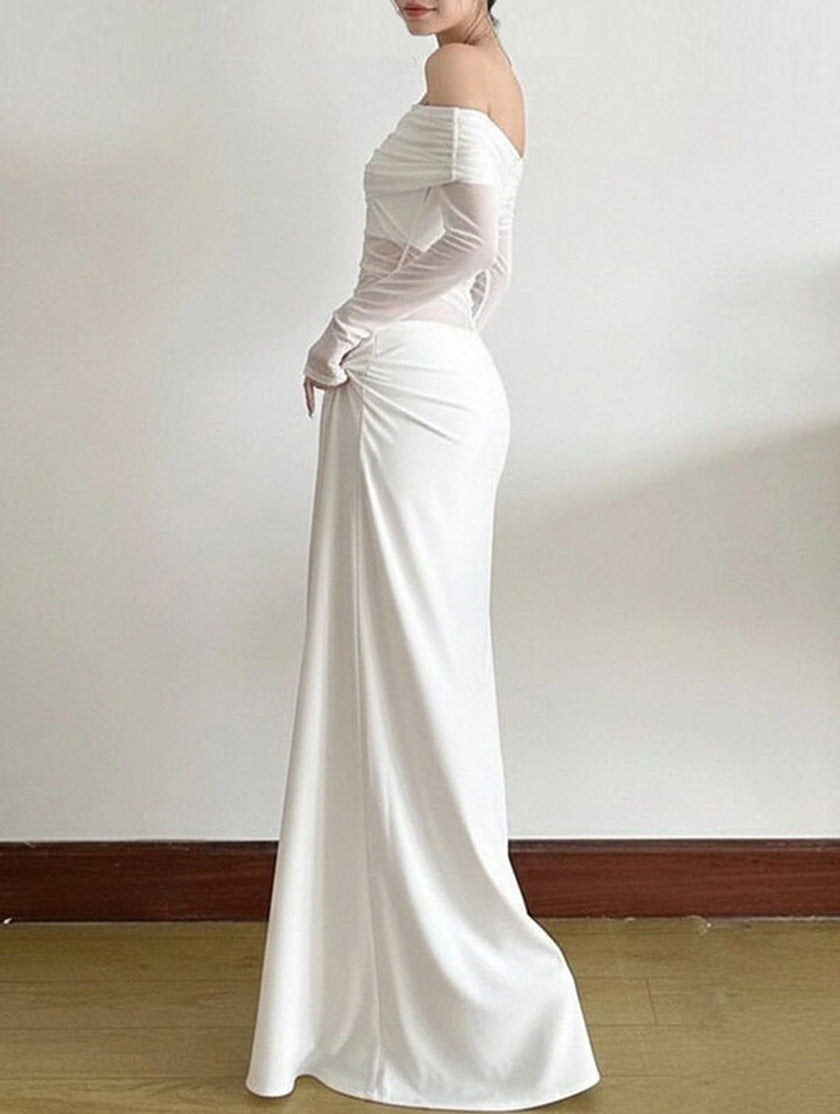 Elegant white French-style slim-fit dress by FJØRNA, showcasing a fitted silhouette and classic design for sophisticated occasions.