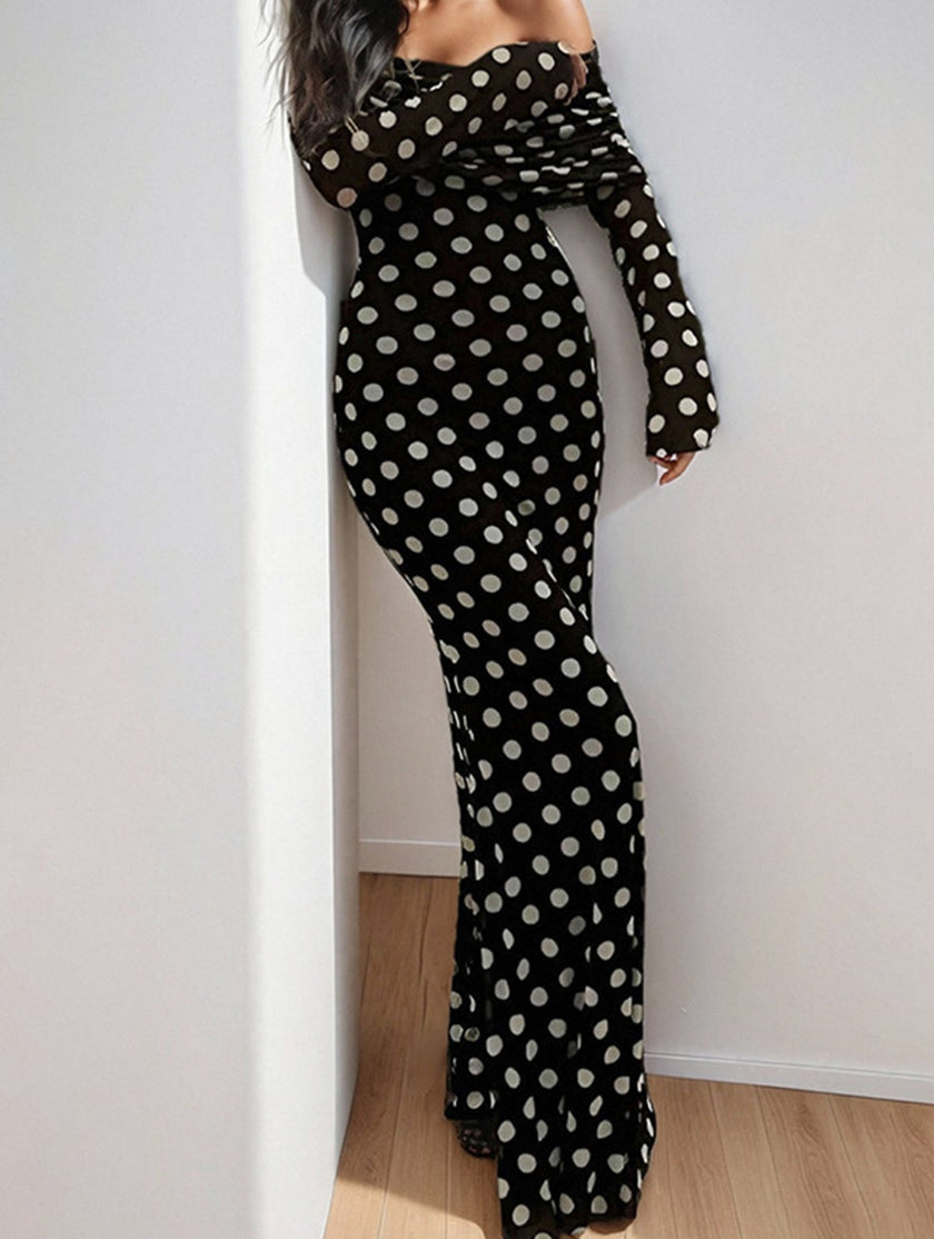 Elegant white polka dot dress by FJØRNA, featuring a sexy silhouette and stylish design for fashionable occasions.