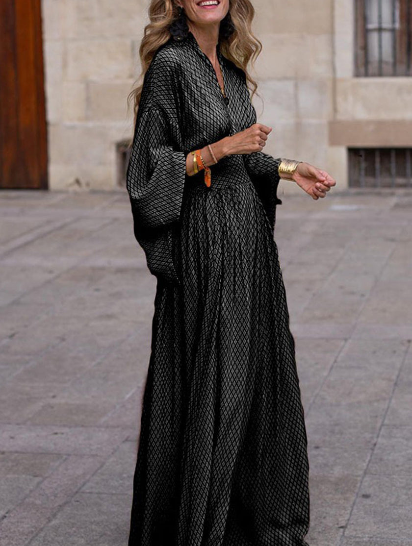 Black slim fit women's dress by FJØRNA, elegant and tailored, shown in a sleek, stylish design.