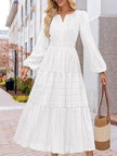 White V-neck tiered puff sleeve maxi dress by FJØRNA, featuring flowing fabric and a stylish layered design.