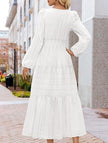 White V neck tiered puff sleeve maxi dress by FJØRNA, featuring flowing fabric and layered design, perfect for elegant summer occasions.