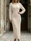 FJØRNA beige cable knit wool long-sleeve dress, stylish and cozy, shown on a mannequin.