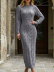 FJØRNA grey cable knit wool long-sleeved dress, fashionable and cozy, shown on a hanger against a neutral background.