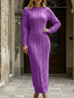 White FJØRNA cable knit long-sleeved wool dress displayed with a fitted silhouette and textured knit pattern.