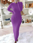 FJØRNA white cable knit long-sleeved wool dress, cozy and stylish, shown on a model with a textured knit pattern.