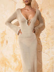 White V-neck long-sleeved knit dress with a sexy backless design from FJØRNA, featuring a fitted silhouette and stylish round neckline.