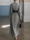 FJØRNA white button-down shirt dress with belt, casual long dress made of lightweight fabric, styled with rolled-up sleeves.