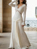 White lace patchwork V-neck dress with bell sleeves by FJØRNA, featuring intricate lace details and a flowing silhouette.