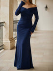 Black FJØRNA one shoulder bodycon evening dress shown on a model, highlighting its sleek fit and elegant design.