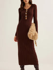 White French vintage V-neck knit bodycon dress by FJØRNA, close-up of fitted silhouette and textured fabric.