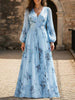 FJØRNA V neck pleated printed white maxi dress with slim fit and flowing design, shown in blue color with a stylish silhouette.