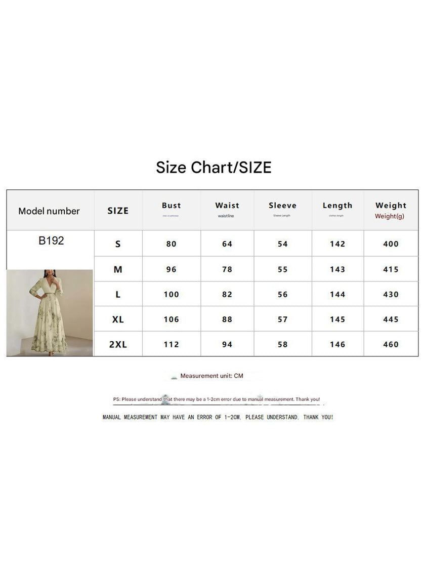 FJØRNA white V-neck pleated printed slim maxi dress displayed on a hanger, showcasing its flowy fabric and elegant design.