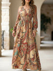 Women's printed V-neck full skirt dress by FJØRNA in khaki, featuring a stylish design and flowy silhouette.