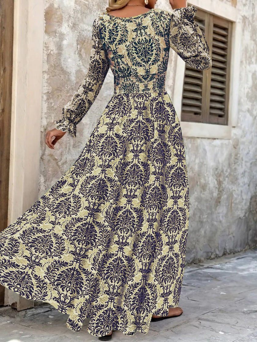 FJØRNA vintage print white V-neck long sleeve maxi dress with elegant flowing fabric and classic design.