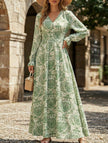 FJØRNA vintage print white V-neck long sleeve maxi dress with elegant flowy fabric, perfect for stylish occasions.