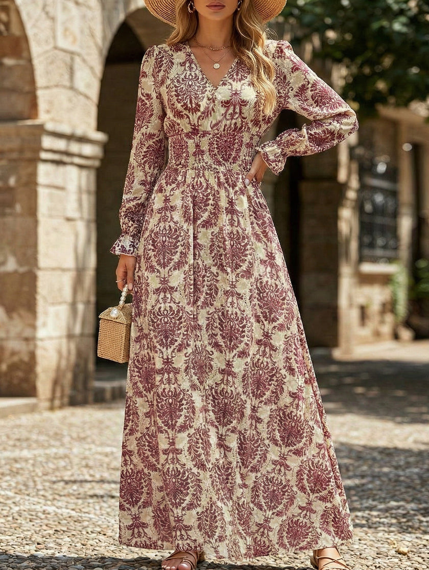 White vintage print V-neck long sleeve maxi dress by FJØRNA, flowing design with intricate pattern and elegant silhouette.