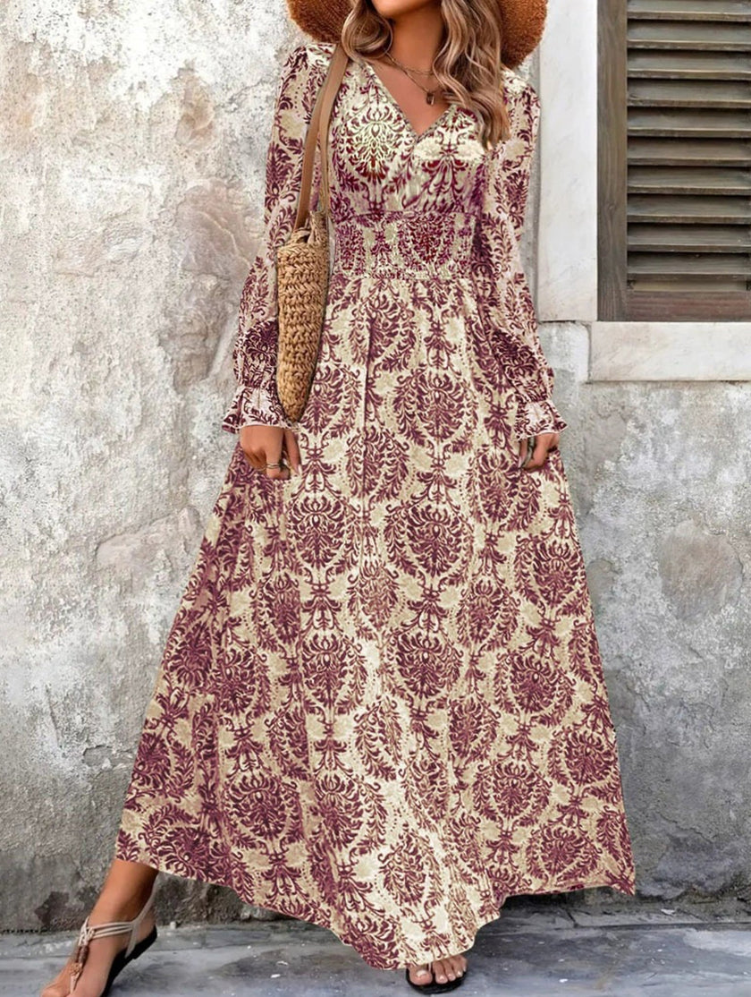 FJØRNA vintage print white V-neck long sleeve maxi dress with a flowing silhouette and elegant design.