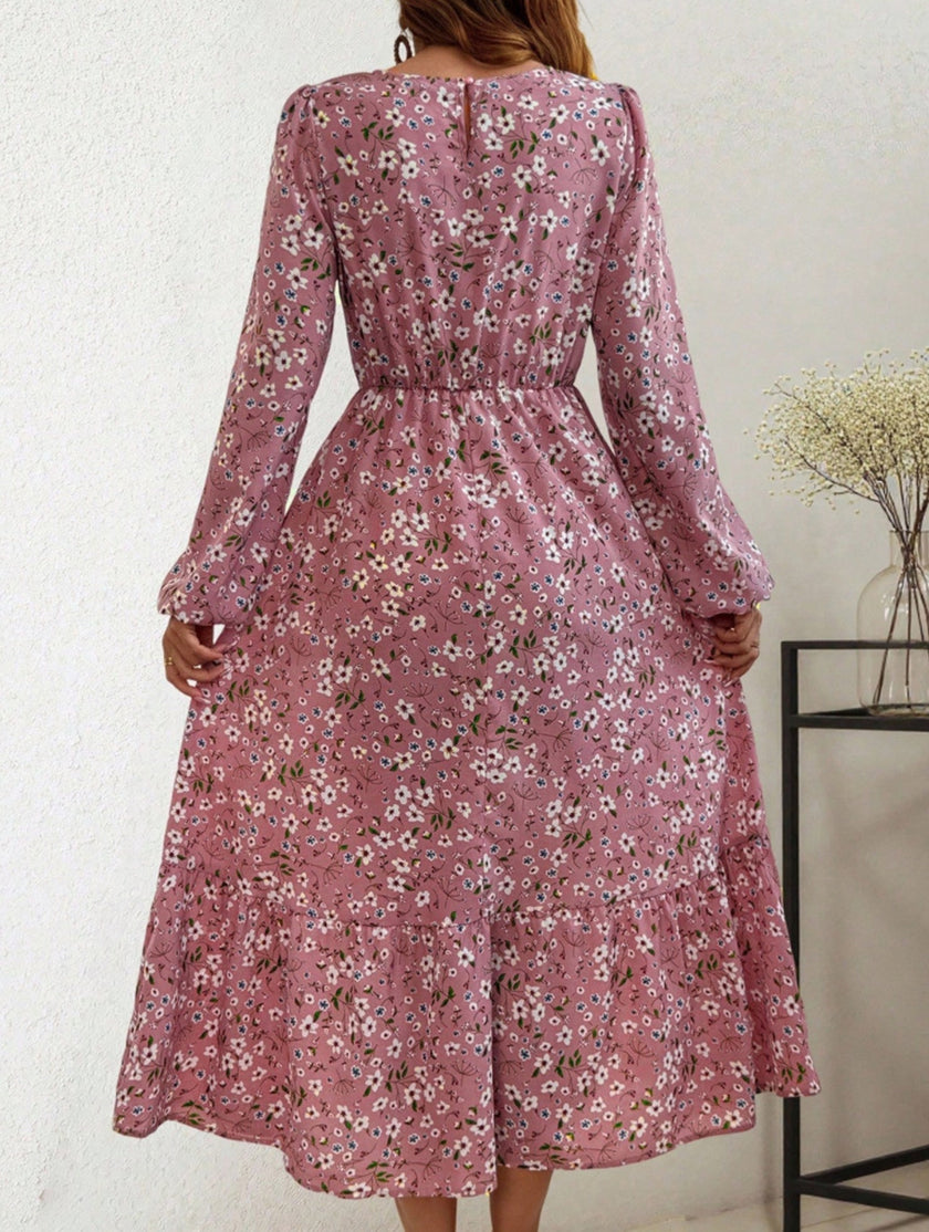 FJØRNA floral high waist long sleeve white midi dress with a feminine design and elegant midi length.