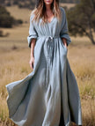 Light blue cotton linen boho hooded dress by FJØRNA, casual wedding dress with relaxed fit and bohemian style.