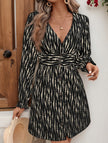 FJØRNA white vertical stripe V-neck slim button dress displayed on a hanger, showcasing the dress's classic design and vertical stripe pattern.