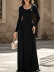 White solid U-neck fit and flare dress by FJØRNA, shown on a model with a stylish, elegant silhouette.