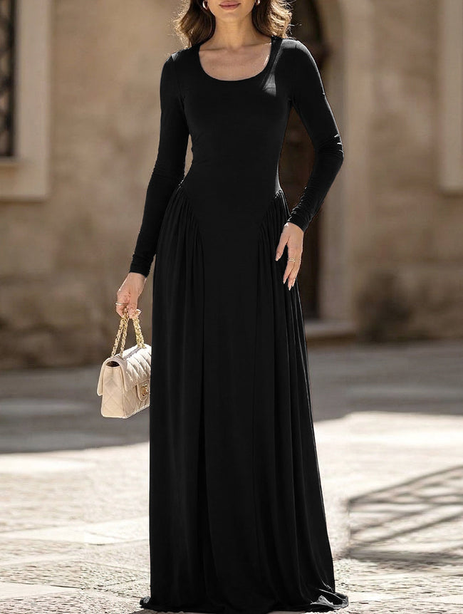 White solid U-neck fit and flare dress by FJØRNA, shown on a model with a stylish, elegant silhouette.
