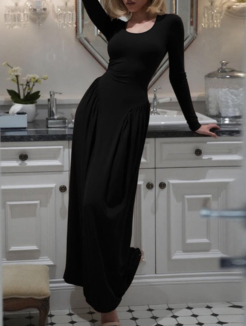 FJØRNA solid white U-neck fit and flare dress shown in black, featuring a flattering silhouette and stylish design.