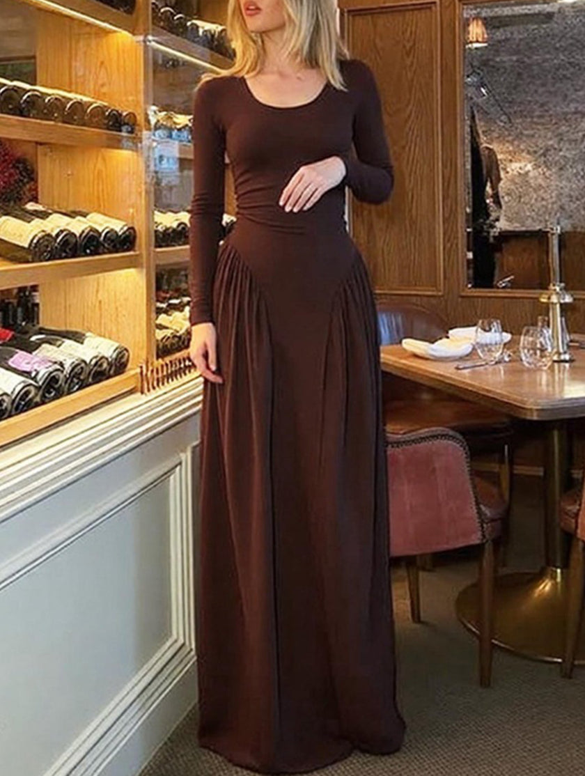 White FJØRNA solid U neck fit and flare dress, sleeveless design, shown on a model with a flared skirt, perfect for elegant occasions.
