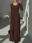 White solid U-neck fit and flare dress by FJØRNA, featuring a stylish silhouette and elegant design, displayed on a model.