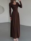 White solid U-neck fit and flare dress by FJØRNA, featuring a stylish silhouette and elegant design, shown on a model.