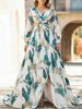 FJØRNA backless white V-neck slit dress displayed on a mannequin, showcasing elegant design and flowing fabric.