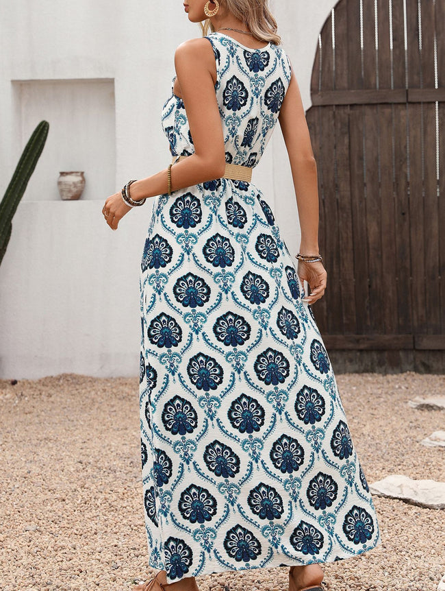 FJØRNA floral print sleeveless dress with slit, white dress with blue floral pattern, lightweight and stylish for warm weather.