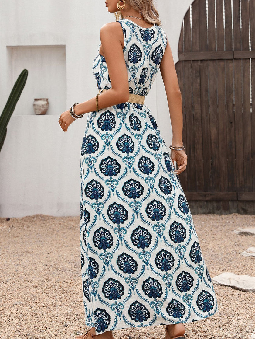 FJØRNA floral print sleeveless dress with slit, white dress with blue floral pattern, lightweight and stylish for warm weather.