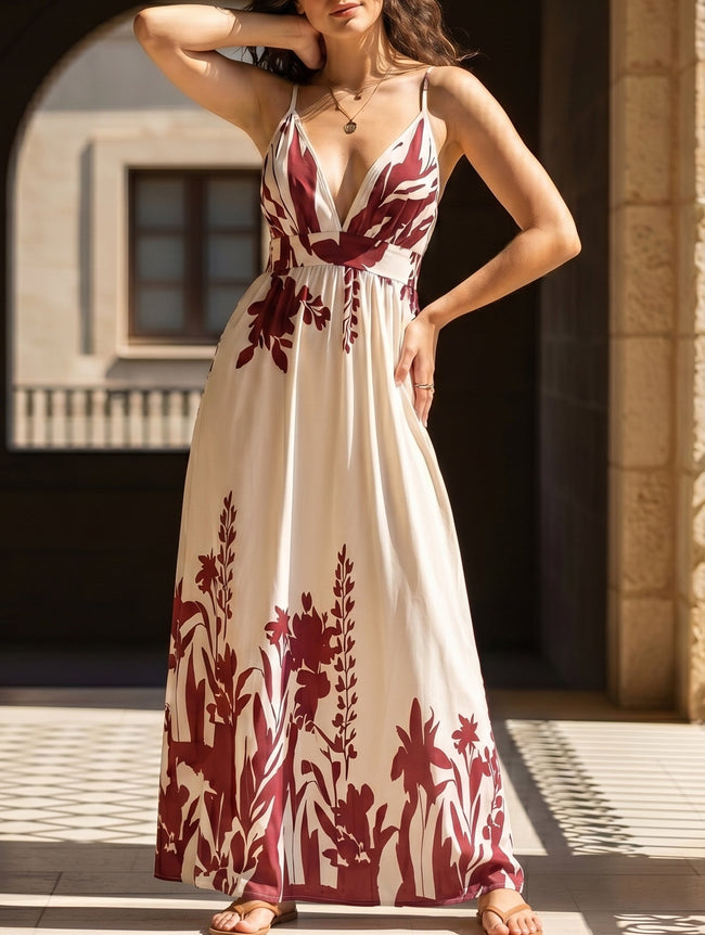White floral print backless cami maxi dress by FJØRNA, flowing sleeveless design with a lightweight, elegant silhouette.