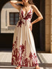 Red floral print backless cami maxi dress by FJØRNA, flowing design with thin straps and vibrant floral pattern.