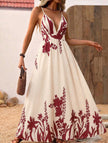 Red floral print backless cami maxi dress by FJØRNA, flowing design with thin straps and a relaxed silhouette.