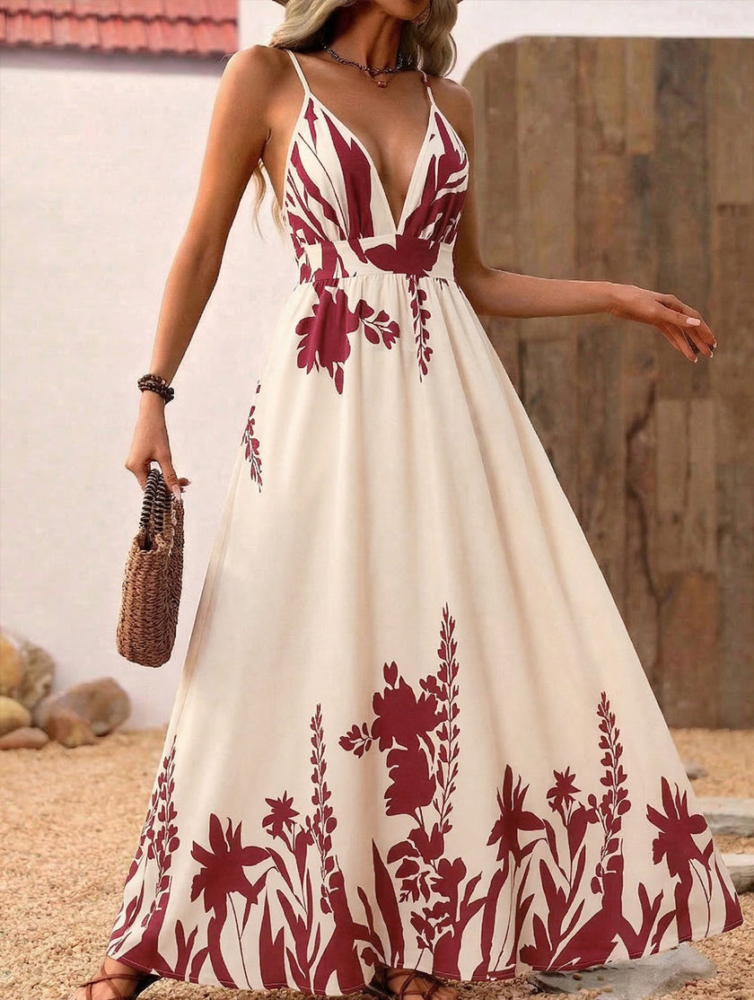 Red floral print backless cami maxi dress by FJØRNA, flowing design with thin straps and a relaxed silhouette.